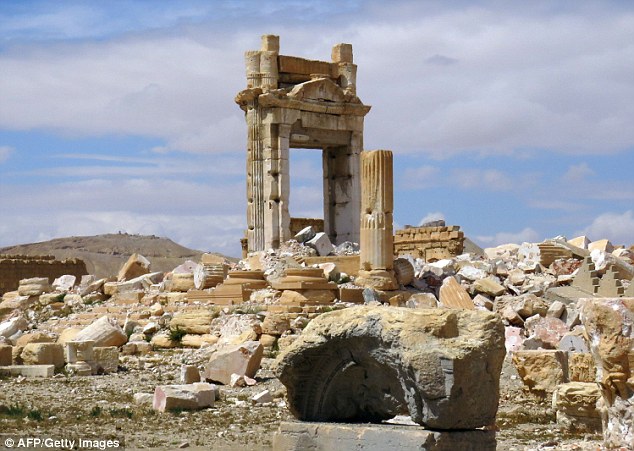 Freedom: His death came just days after Syrian soldiers entered the destroyed city of Palmyra (pictured)