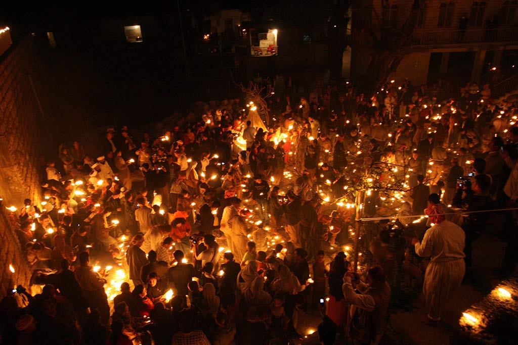 Yazidis in Lalish celebrate Yazidi New Year marking the descent to earth at Lalish of Melek Taus (Kurdish: Tawusê Melek), the 'Peacock Angel'.